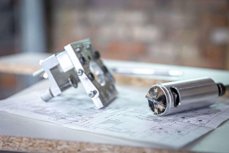 Project 3 close up of a precision drilling device and a hing 2023 11 27 04 58 00 utc 1