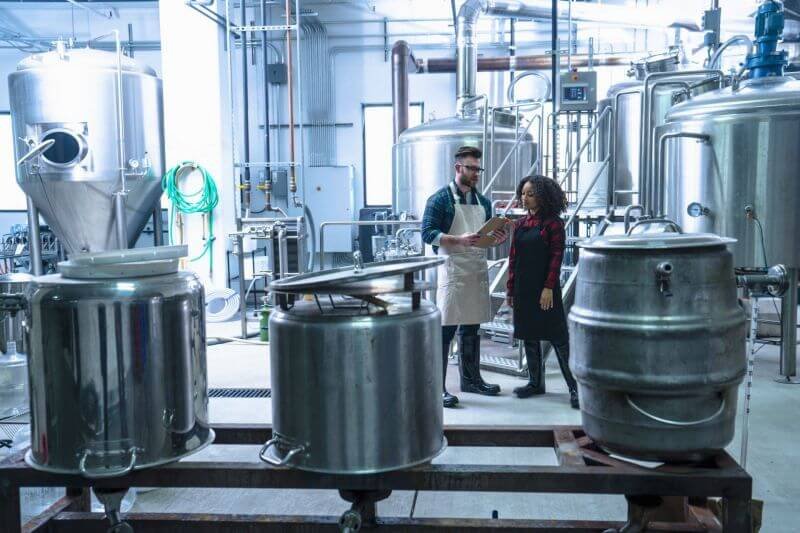 about factory 9 colleagues in brewery standing looking at clipboar 2023 11 27 05 36 27 utc 1