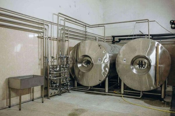 service table images content 8 row of shiny metal micro brewery tanks beer facto 2023 11 27 05 15 23 utc
